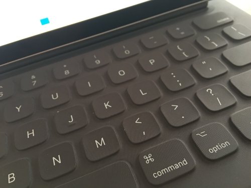 The Smart Keyboard has a very nice tactile feel, but lacks certain keys (like ESC, HOME, END)