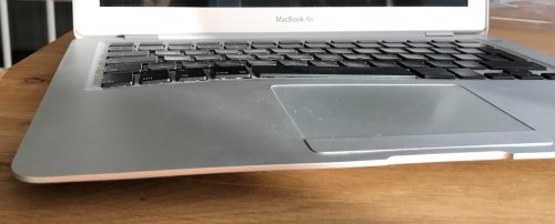 That bobble is not supposed to be there.., causing the keyboard to be bend