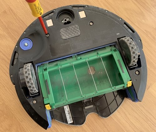 Remove the bottom cover to access the inside of the Roomba
