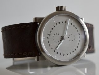 Last month I received my custom made wristwatch from Switzerland, it is a minimalistic mechanical annual calendar designed to be understated and true to the metal.