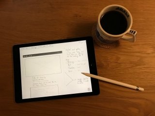 Using iPad Pro with Apple Pencil next to my computer to form a create powerhouse