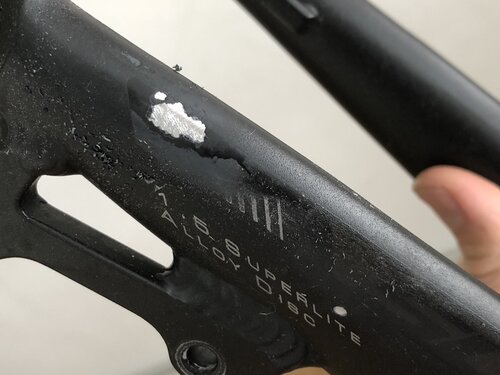 scratched aluminum bike frame