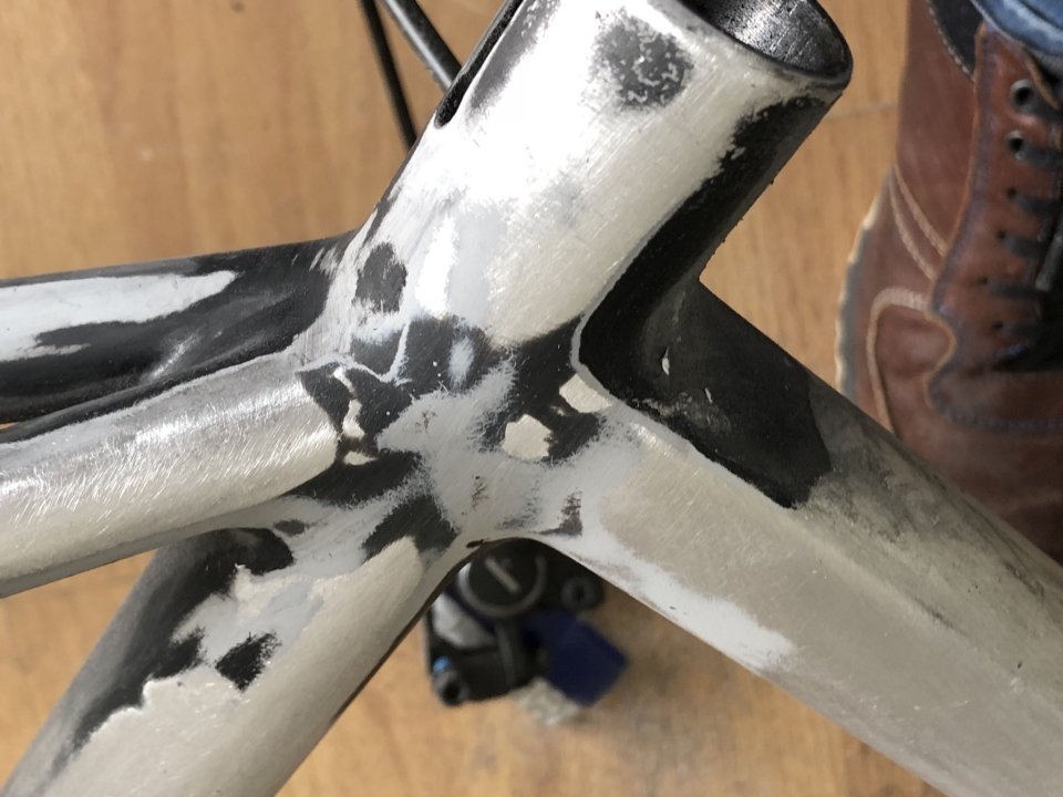 Removing paint from a bike frame Uncover the aluminium with chemicals