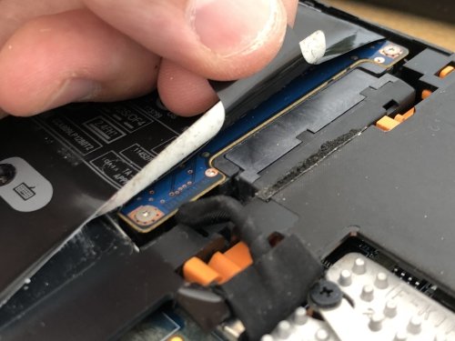 Replacement disk tucked way inside the laptop