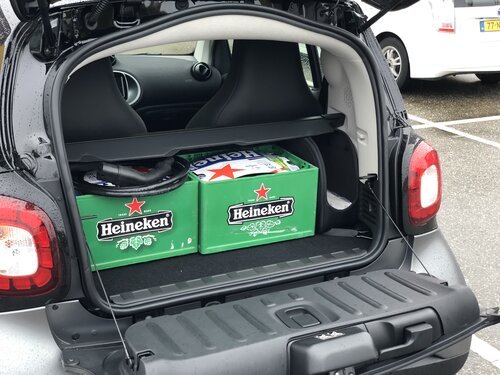 Two boxes of beer fit comfortably in the luggage compartment of the Smart