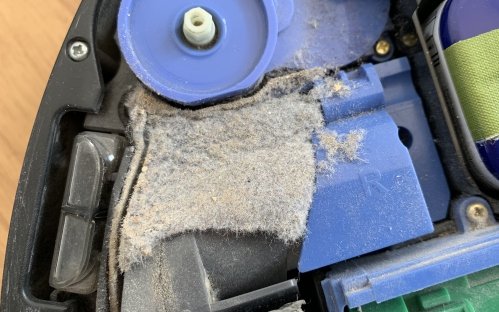 Looks like a carpet, but this is dust collected on the inside of Roomba