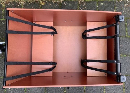 Inside the cargo box are two flippable benches