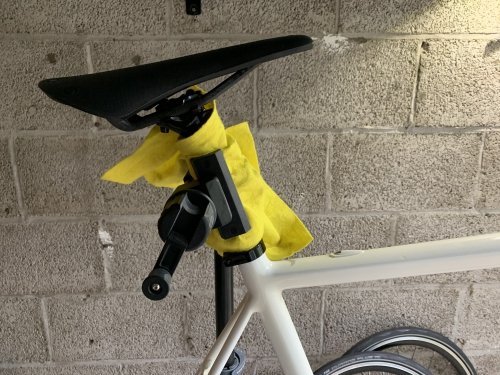 The seat post tube is a good place to fix your bike in the work stand