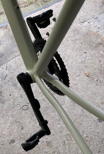 Crank and pedals installed on the bike frame - make sure to check if it can move freely