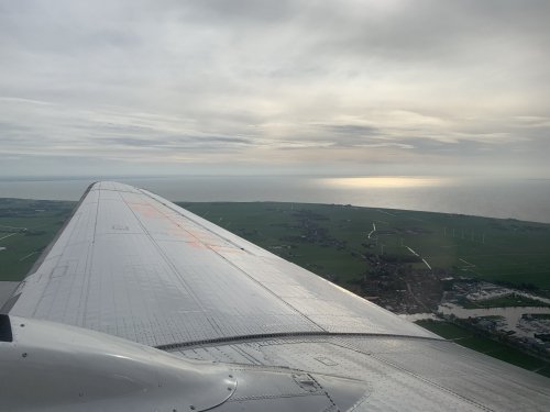 PH-PBA wing over Friesland, the Markermeer on the horizon