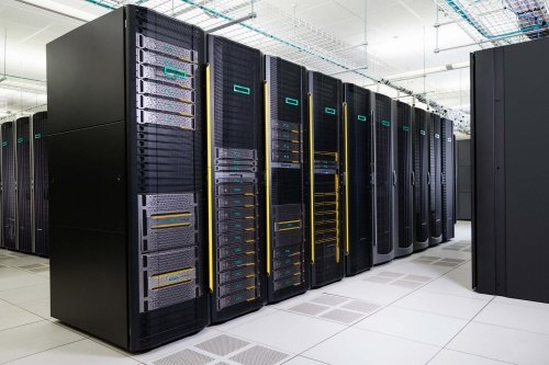 Servers in a datacenter: the black racks are like closets for the grey server computers, each rack fits multiple servers (photo: HPE). 