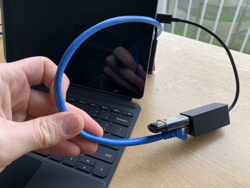 Connecting the bootable USB drive to the Surface tablet using the USB-C to USB 3.0 and ethernet dongle