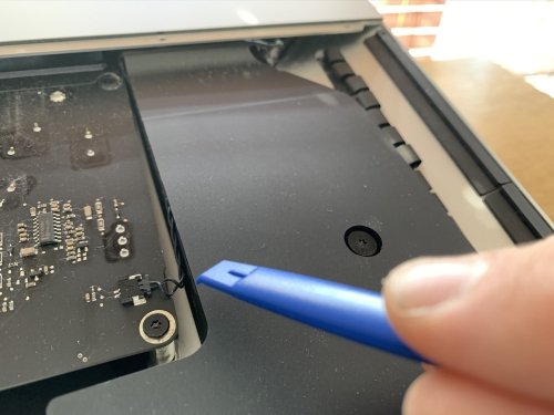 Disconnecting the power button cable