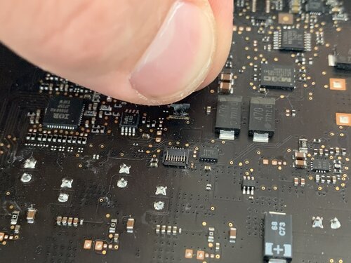 Disconnecting the microphone cable - right under my thumb - it's very tiny!