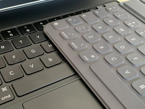 The Magic Keyboard is made like a laptop keyboard (with distinct keys and ditto mechanisms) - the Smart Keyboard Folio is made with a woven fabric from a single piece of material
