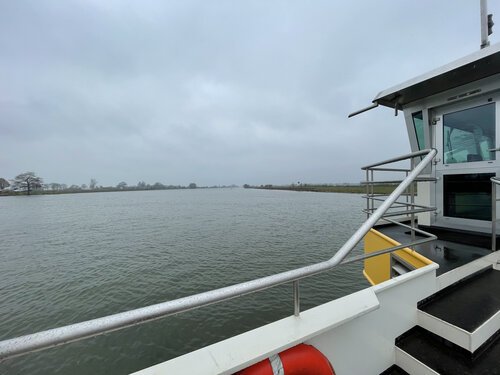 Crossing the last river by ferry