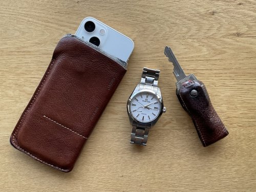My everyday carry: iPhone Mini, an analogue watch and keys