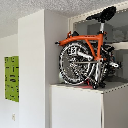 In my small apartment in Amsterdam I put my Brompton bike on top of the fridge - one might even consider it another piece of art, ha!