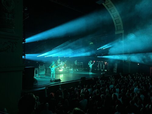 Blue lights from the podium perfectly complimenting MUSE's electrifying sound