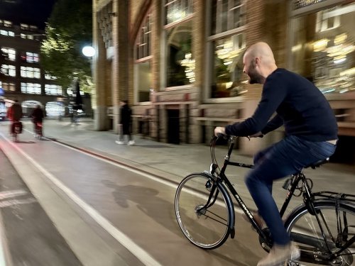Experience the thrill of Amsterdam's vibrant nightlife, all within reach of your bike!