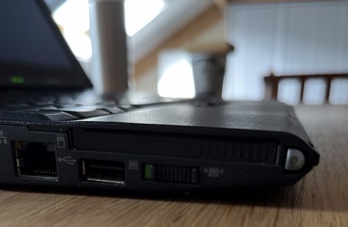 Plenty of hardware ports, including a PC-card slot, integrated gigabit ethernet, USB-A and a hardware switch to disable WiFi
