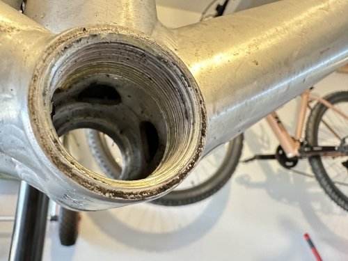 Once the bottom bracket was removed, I was able to see the holes inside the bike frame.