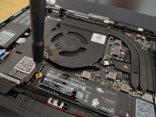 The 8TB SSD is secured with a single screw