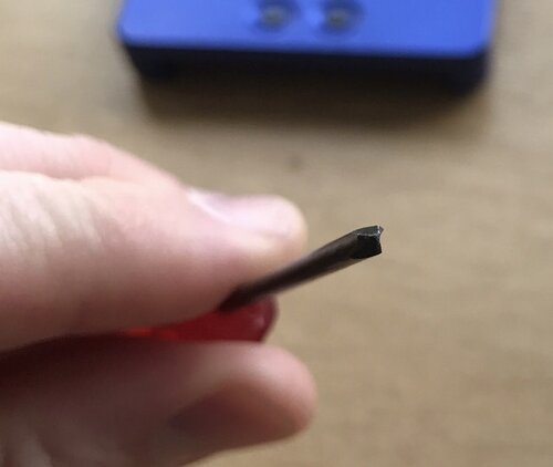Using the right tools: a Tri-wing triangular screwdriver