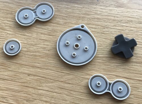 Clever hardware design: each button fits exactly on one position and orientation only!