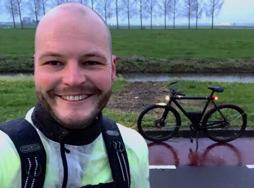 That smile is not because of the fantastic Dutch weather... it's because of that rocket disguised as bike