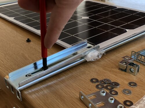 Clamping the solar panel using server parts