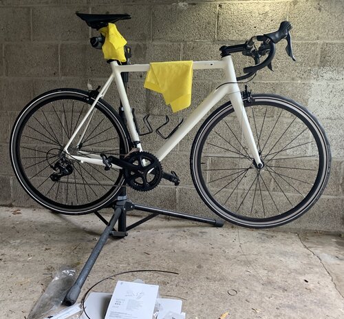 Indexing the gears is easier when you're able to peddle freely, allowing you to precisely set the cable tightness