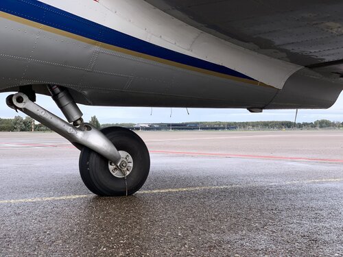 The tail wheel of the C-47-A PH-PBA is quite close to the ground when parked on the platform
