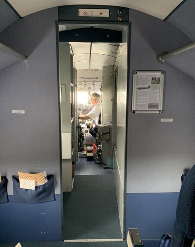 Inside the cabin you have a clear view into the cockpit as there is no door separating the pilots from the passengers
