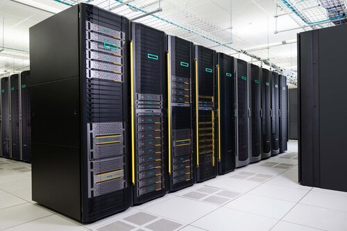 Servers in a datacenter: the black racks are like closets for the grey server computers, each rack fits multiple servers (photo: HPE).