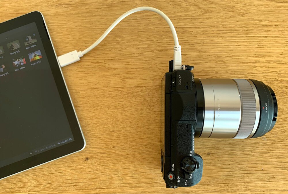 Importing new photos from my camera is easy - very much like the Apple iPhoto ad from 2002!