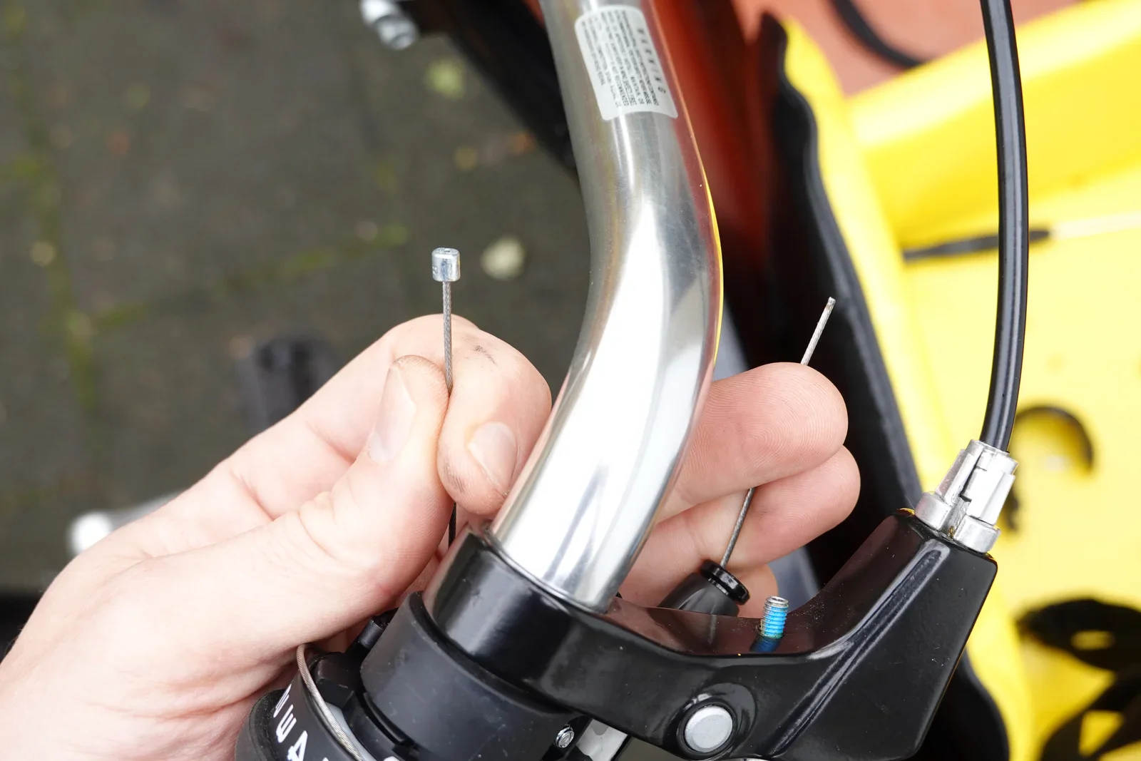 Install the new shifter cable starting from the handle bar
