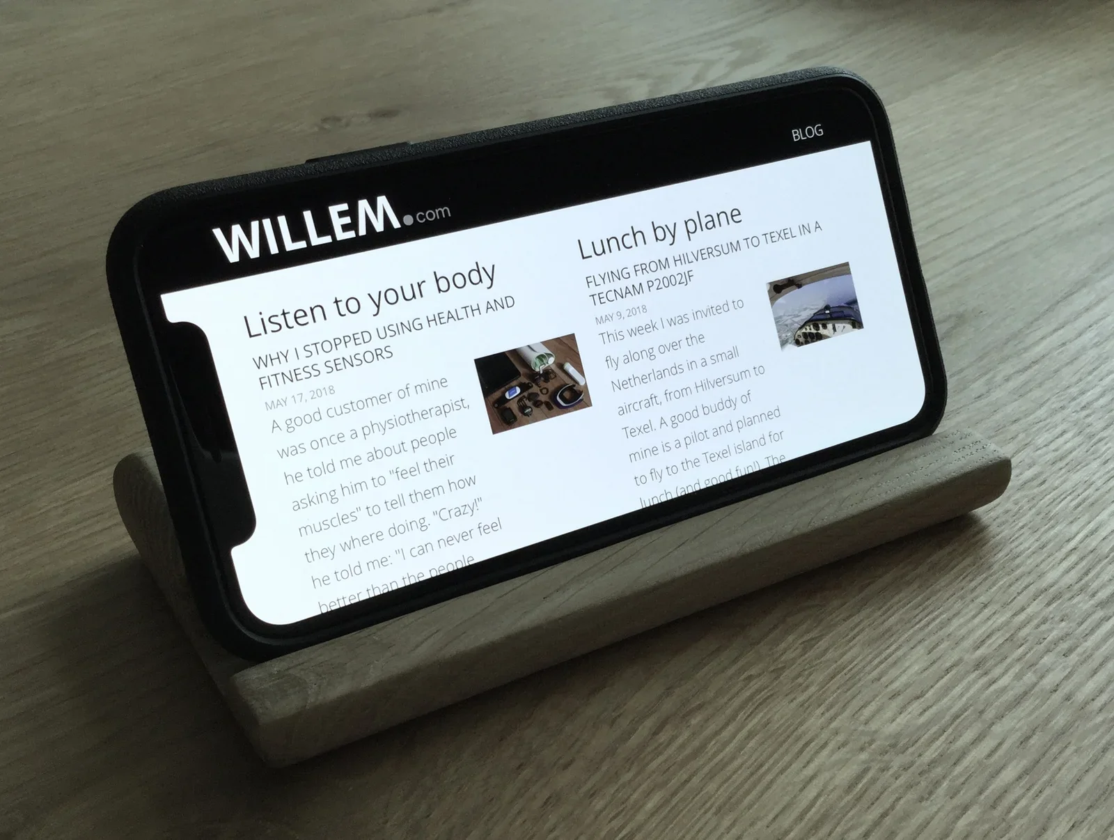 The touch screen is fully accessible, the front ridge is slightly recessed to allow "swipe up" gestures