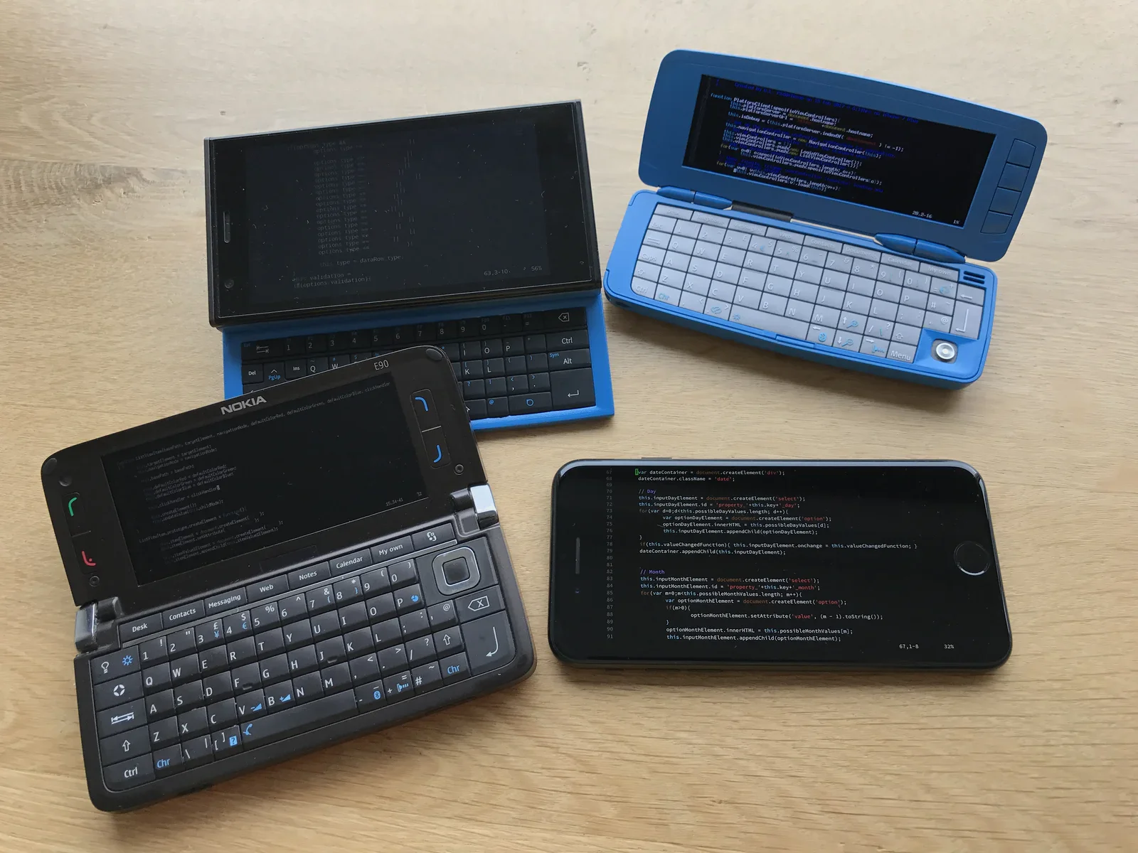 Multi platform development done properly, Nokia Communicator E90 with Symbian series 60 from 2007, Nokia 9300i running Symbian series 80 from 2004, Jolla phone with SailfishOS with the funky other half keyboard (tohkbd), and the iPhone 7.