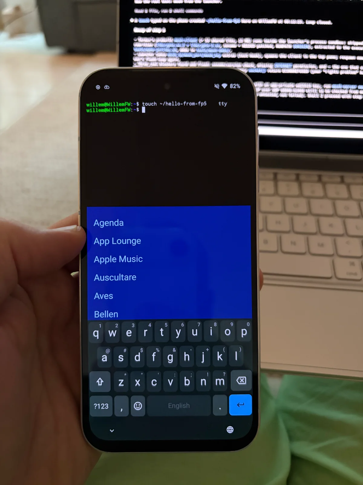 18 August, first evening: the Fairphone with the stock app list, the launcher a few hours away
