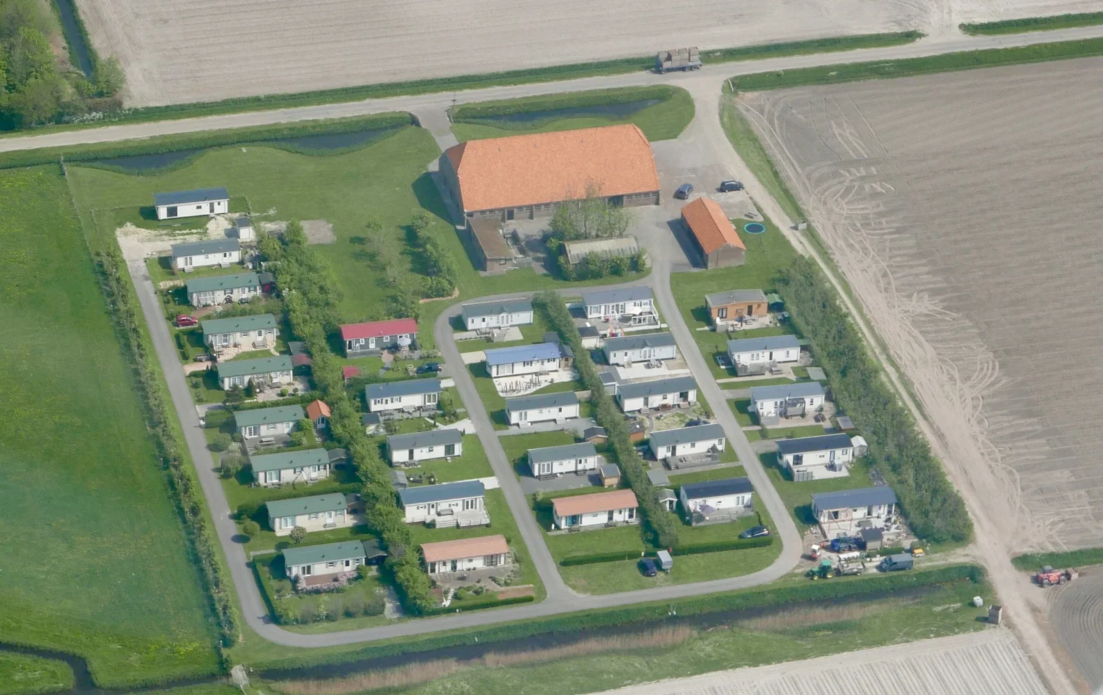 Chalets seen from above at Jachtlust Recreatie, Slufterweg 380, Texel