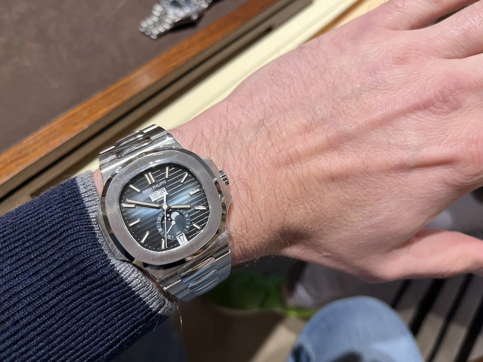 Wearing a Patek Philippe Nautilus annual calendar - the Nautilus was originally crafted by the esteemed watch designer Gerald Genta - an icon