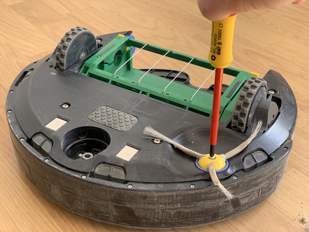 Draai de draaiende borstel los